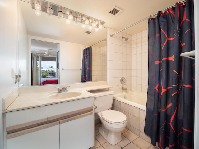 full bathroom with shower / bath combo with shower curtain, tile patterned flooring, vanity, and toilet