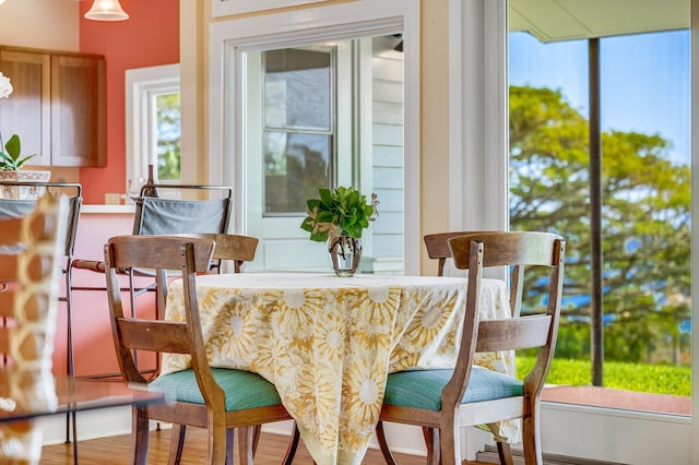 dining room with wood finished floors