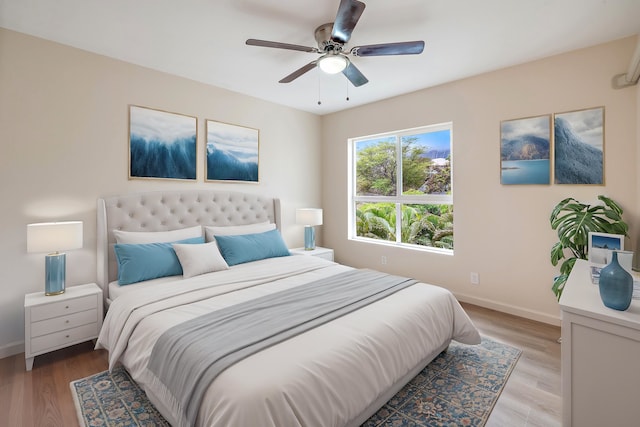 bedroom featuring ceiling fan and light wood-type flooring