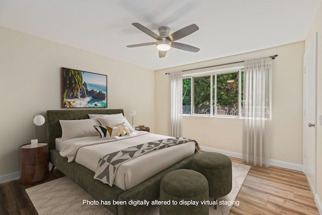 bedroom featuring ceiling fan and light wood-type flooring