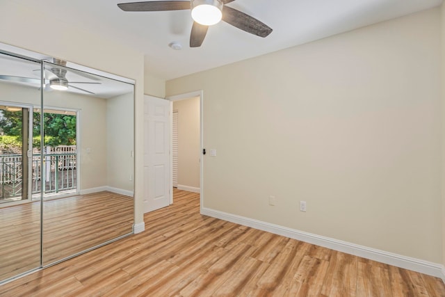 spare room featuring ceiling fan and light hardwood / wood-style floors