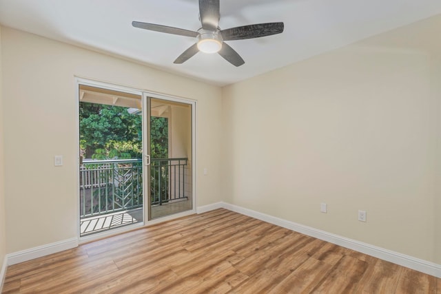 empty room featuring light hardwood / wood-style flooring and ceiling fan