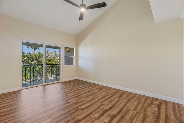 empty room featuring hardwood / wood-style floors, ceiling fan, and high vaulted ceiling