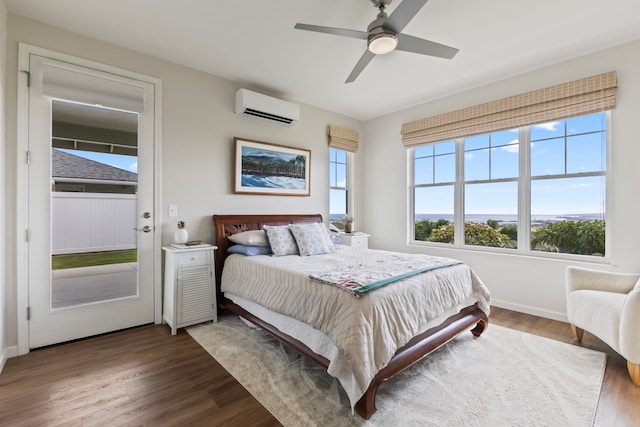 115 Nanu Pl, Wailuku, HI 96793 - bedroom with a wall mounted air conditioner, dark wood-style floors, access to outside, and a ceiling fan