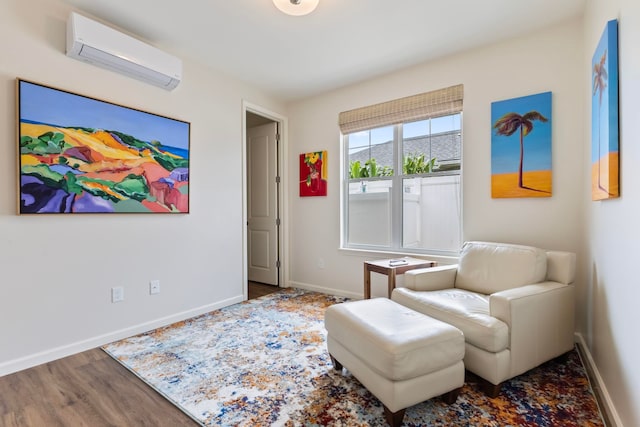 115 Nanu Pl, Wailuku, HI 96793 - living area with an AC wall unit and wood finished floors