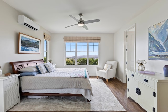 115 Nanu Pl, Wailuku, HI 96793 - bedroom with an AC wall unit, multiple windows, dark wood-style flooring, and a ceiling fan