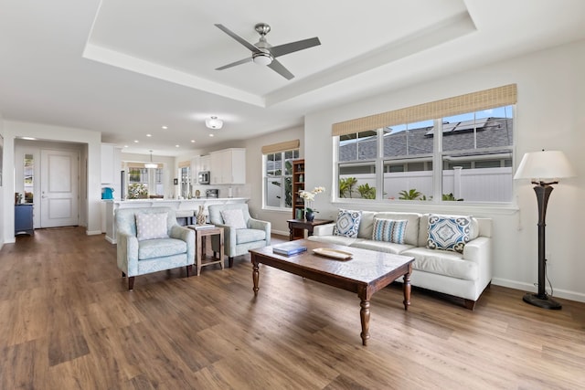 115 Nanu Pl, Wailuku, HI 96793 - living room featuring a raised ceiling, wood finished floors, a ceiling fan, and recessed lighting
