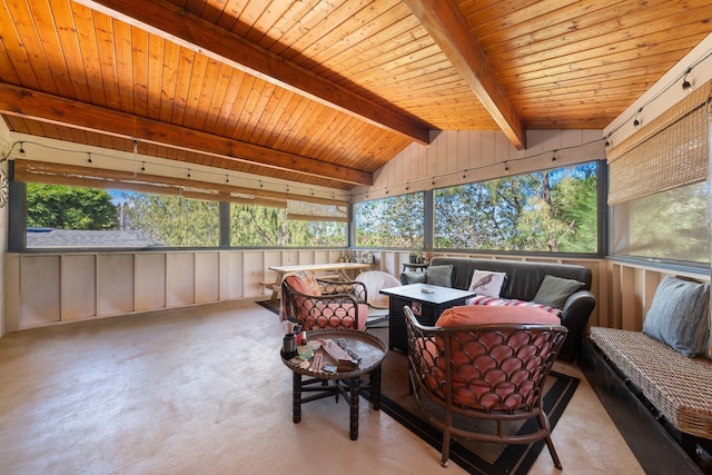 sunroom / solarium featuring plenty of natural light, lofted ceiling with beams, and wooden ceiling