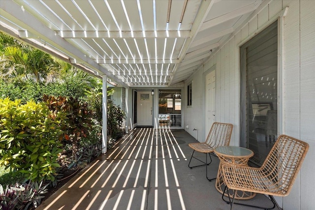 view of terrace with a pergola