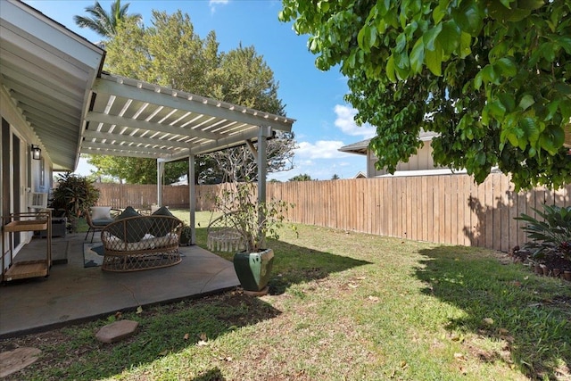 view of yard with a patio, a pergola, and an outdoor fire pit