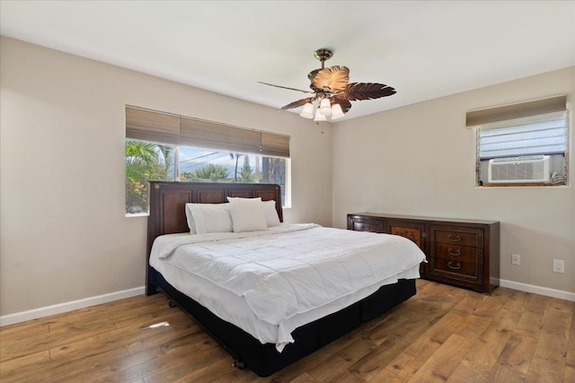 bedroom featuring ceiling fan and wood-type flooring