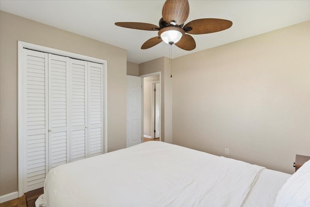 bedroom featuring a closet, ceiling fan, and hardwood / wood-style flooring