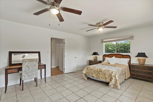 tiled bedroom with ceiling fan