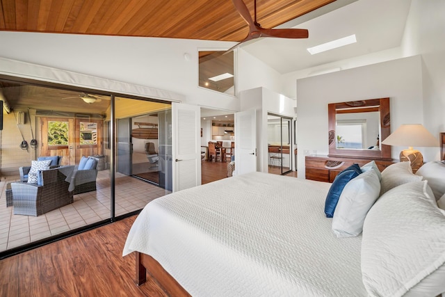 bedroom with wood ceiling, hardwood / wood-style flooring, high vaulted ceiling, and ceiling fan