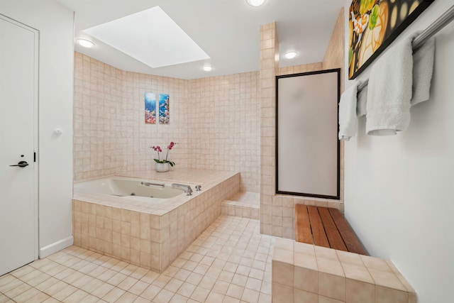 bathroom featuring tile walls, a skylight, tile patterned flooring, and plus walk in shower