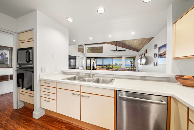 kitchen with lofted ceiling, ceiling fan, dark hardwood / wood-style floors, black appliances, and sink