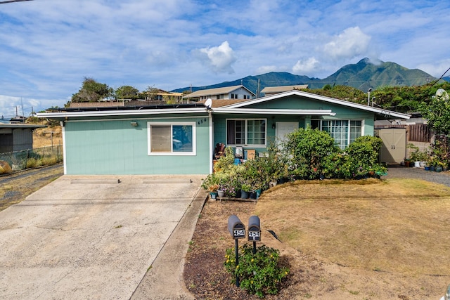 454 S Papa Ave, Kahului, HI 96732 - ranch-style home featuring a mountain view, fence, and solar panels