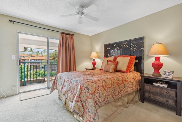 carpeted bedroom featuring access to outside, ceiling fan, and a textured ceiling