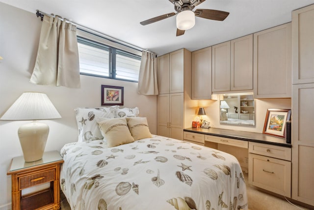 bedroom featuring light carpet and ceiling fan