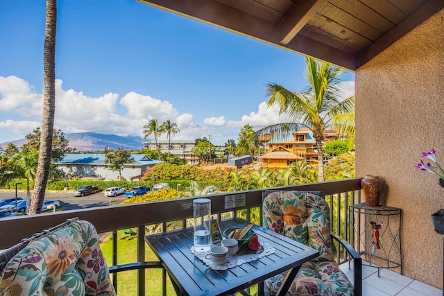 balcony featuring a mountain view