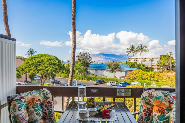 balcony featuring a mountain view