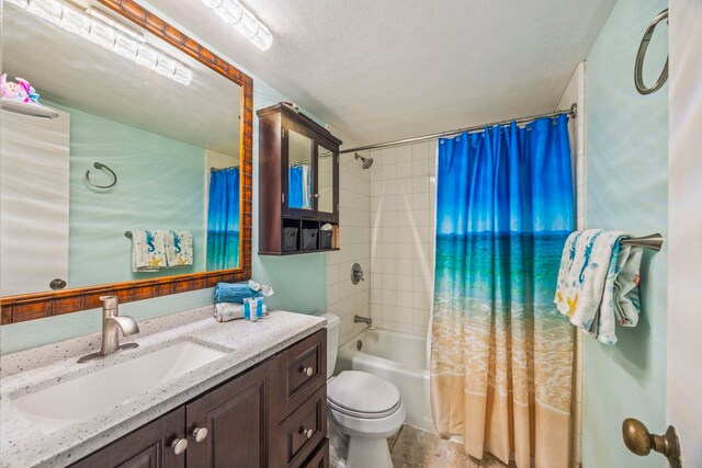 full bathroom featuring vanity, shower / bathtub combination with curtain, a textured ceiling, and toilet