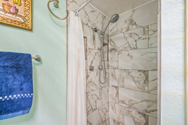 bathroom featuring a shower with curtain