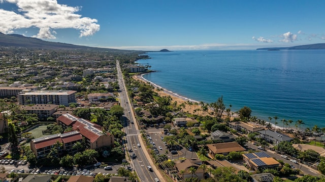 birds eye view of property featuring a water and mountain view