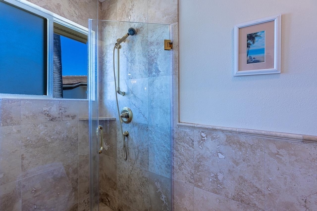 bathroom featuring a shower stall