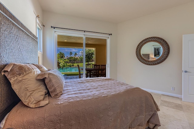 bedroom with baseboards, multiple windows, and access to outside
