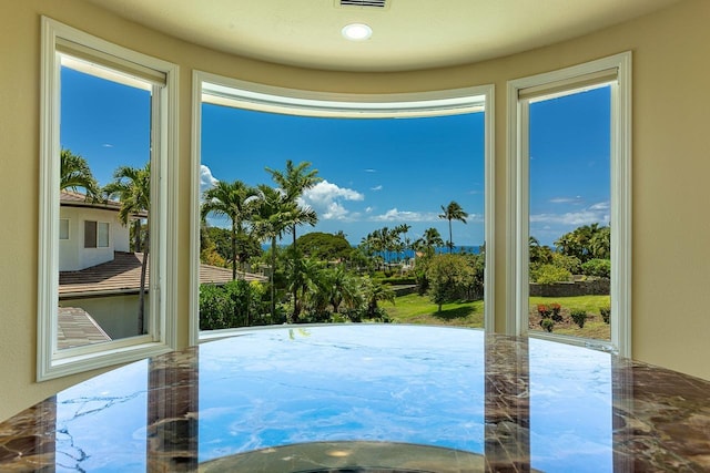 doorway to outside featuring visible vents