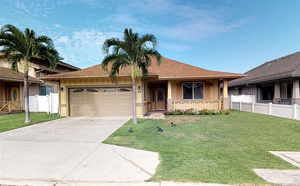 single story home with a garage, covered porch, and a front yard