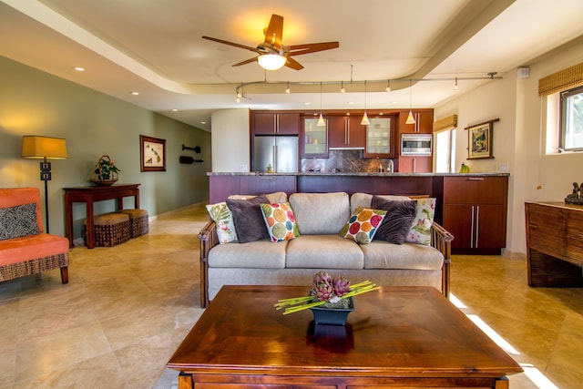 living room featuring ceiling fan