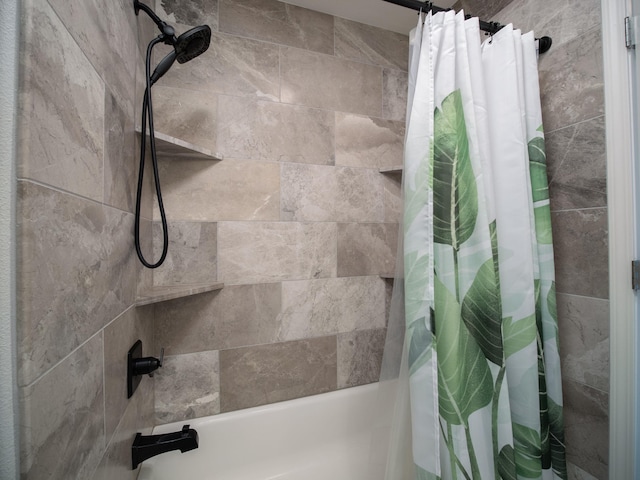 bathroom featuring shower / bathtub combination with curtain