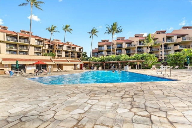 community pool featuring a patio