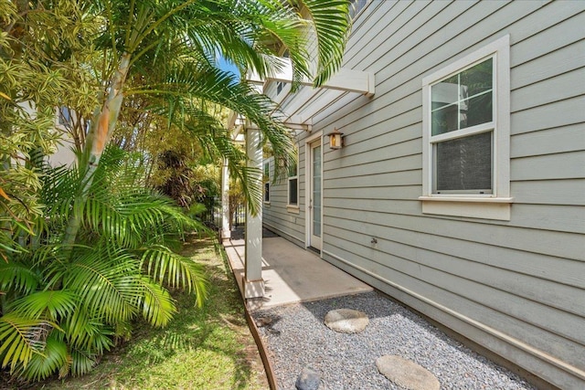 view of property exterior featuring a patio