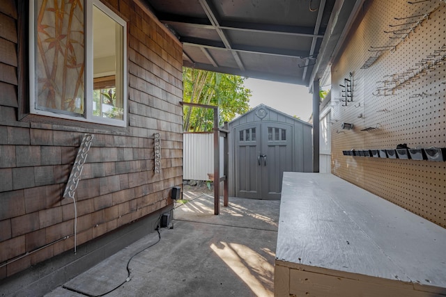 view of patio with a shed