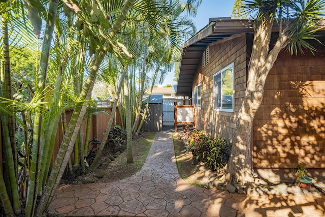 view of home's exterior with a shed