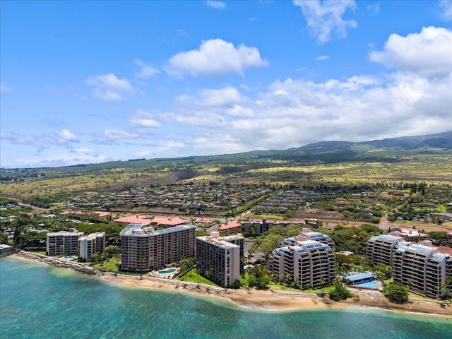 birds eye view of property featuring a water view and a view of the beach