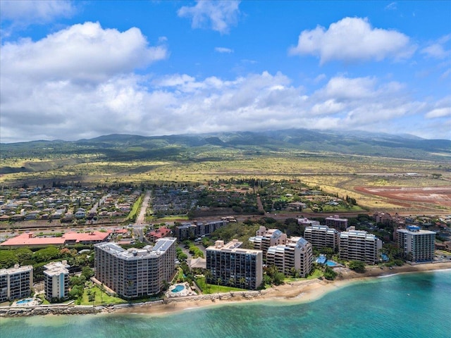 bird's eye view featuring a beach view and a water and mountain view