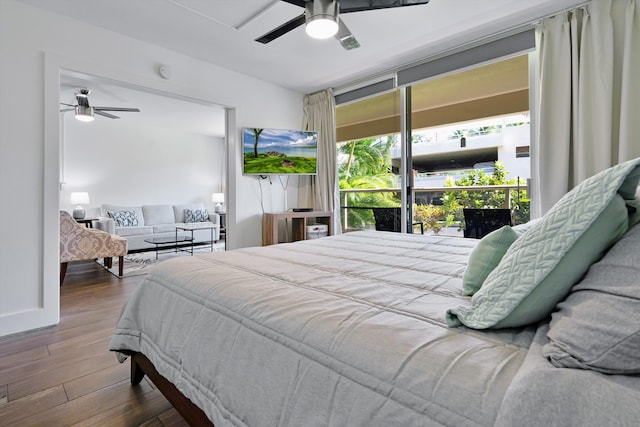 2575 S Kihei Rd Unit P-104, Kihei, HI 96753 - bedroom with wood finished floors and a ceiling fan
