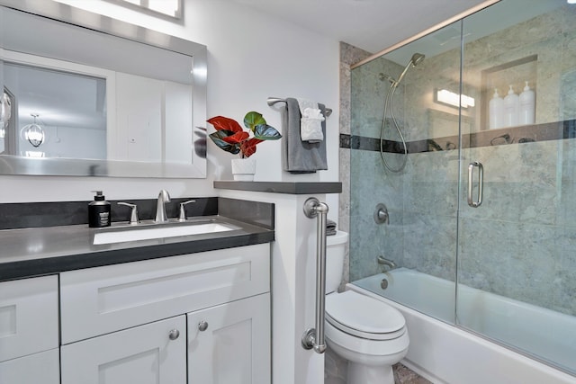 2575 S Kihei Rd Unit P-104, Kihei, HI 96753 - bathroom featuring toilet, vanity, and bath / shower combo with glass door