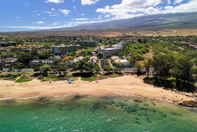 2575 S Kihei Rd Unit P-104, Kihei, HI 96753 - aerial view of property and surrounding area with a mountain backdrop and nearby beach