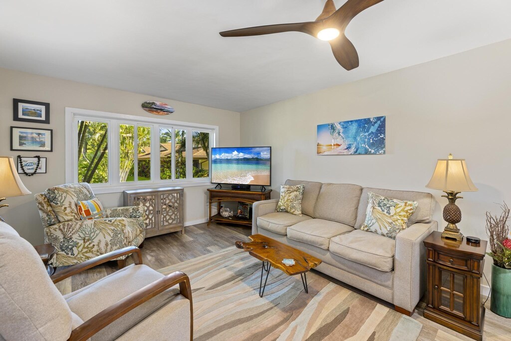 3788 Lower Honoapiilani Rd Unit A 110, Lahaina, HI 96761 - living area featuring light wood-type flooring and ceiling fan