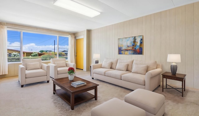 living area with light colored carpet