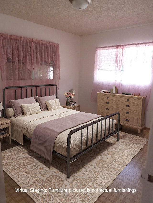 1525 Pakali Pl, Lanai City, HI 96763 - bedroom featuring a textured ceiling