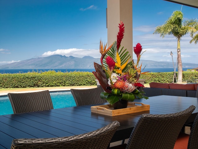 balcony featuring a deck with mountain view