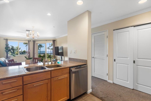 kitchen featuring sink, ornamental molding, dishwasher, a notable chandelier, and light colored carpet