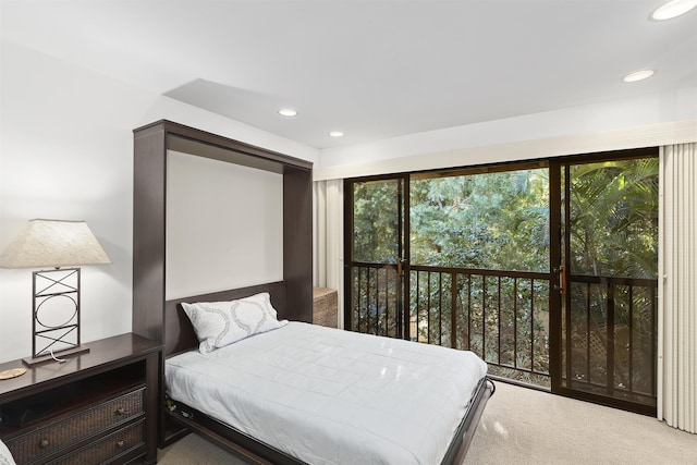 carpeted bedroom with recessed lighting