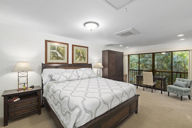 bedroom featuring attic access, recessed lighting, light colored carpet, and visible vents